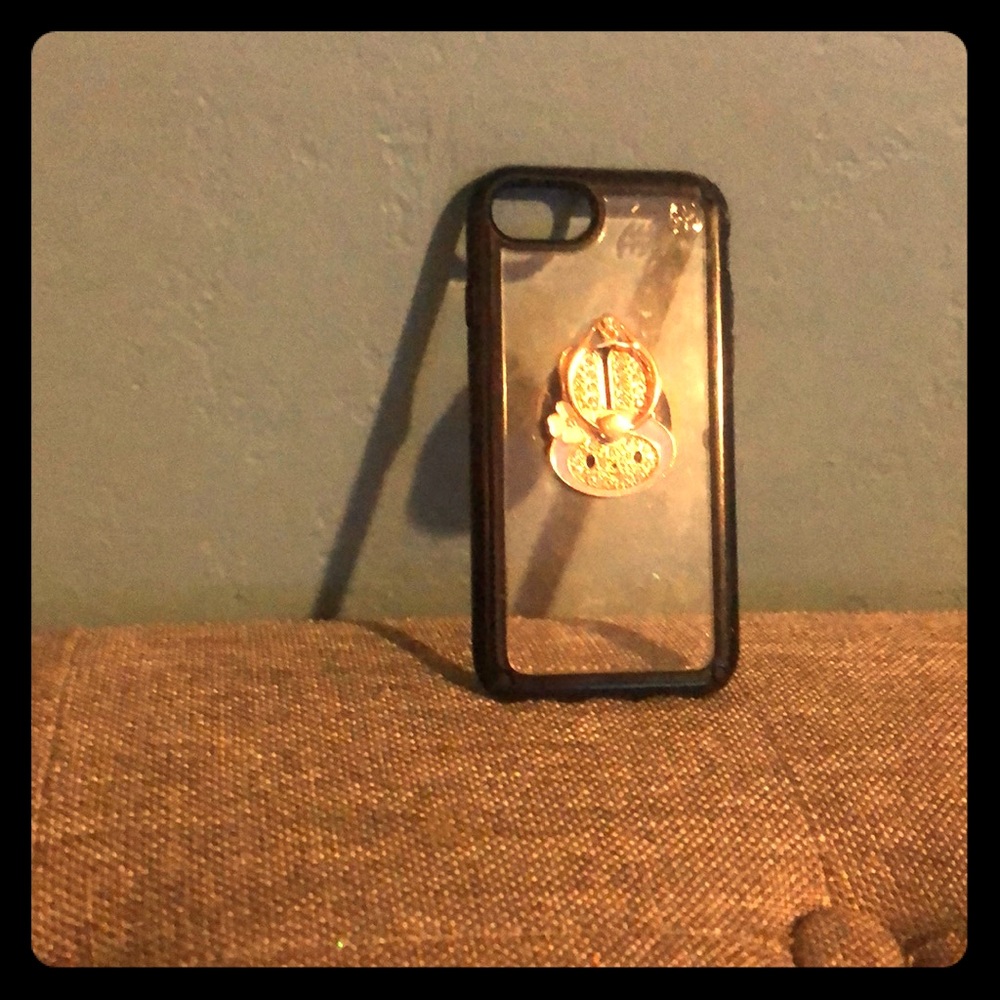 Clear phone case with black outline and pop socket